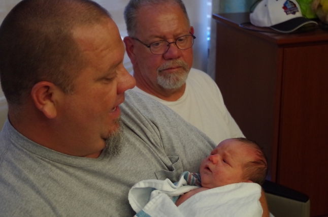 Uncle Matt and Grandpa Steve made their way to the hospital on Friday and actually got to hold Brady a bit.  